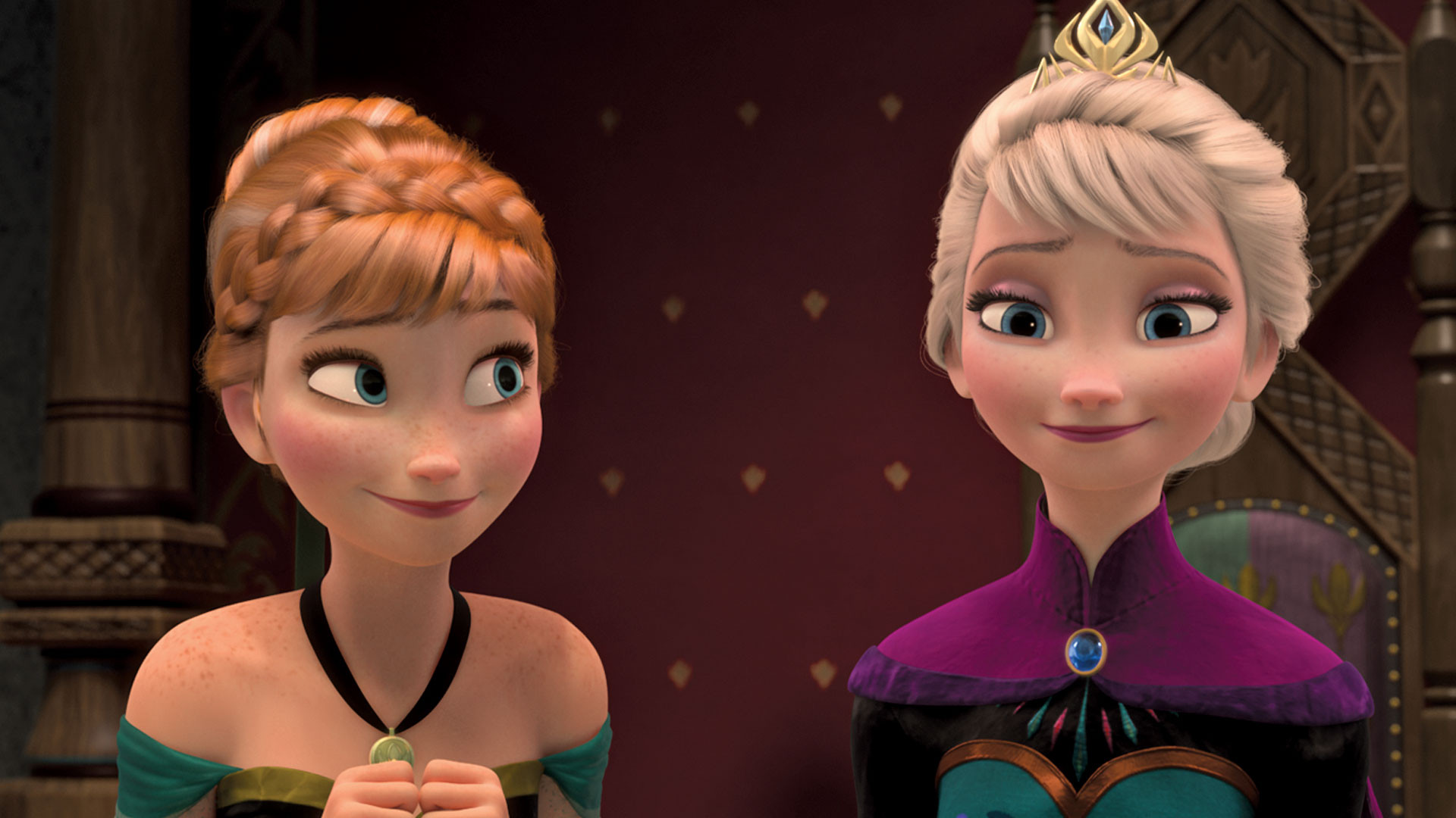 Cena do filme Frozen mostrando duas personagens principais em trajes formais, perfeitas para entrar no clima gelado e mágico do Natal.